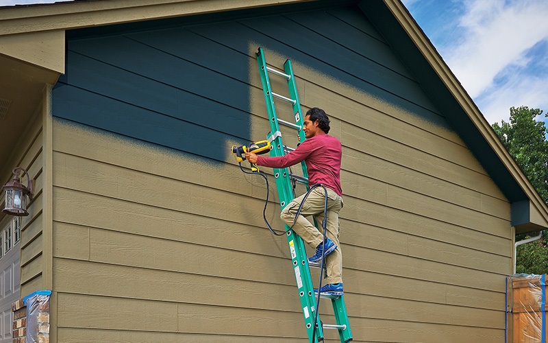 What Are The Benefits Of Spray Painting A House?