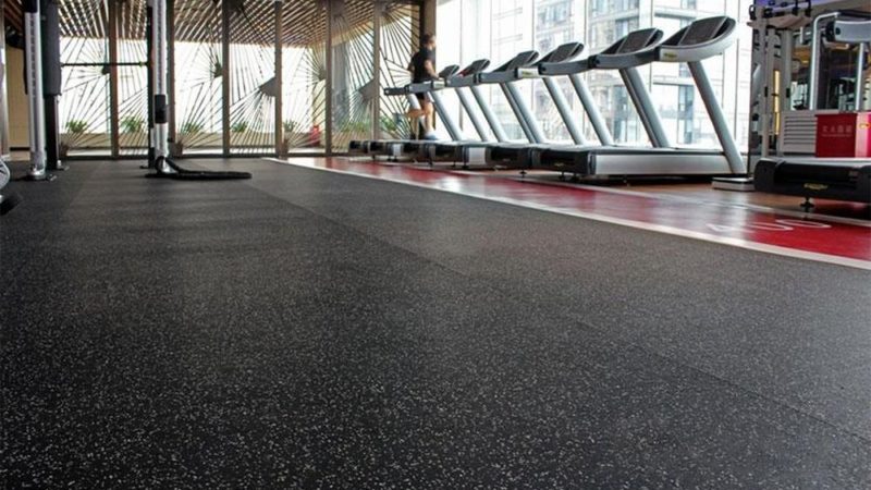 What are the benefits of using rubber flooring in a home or commercial space