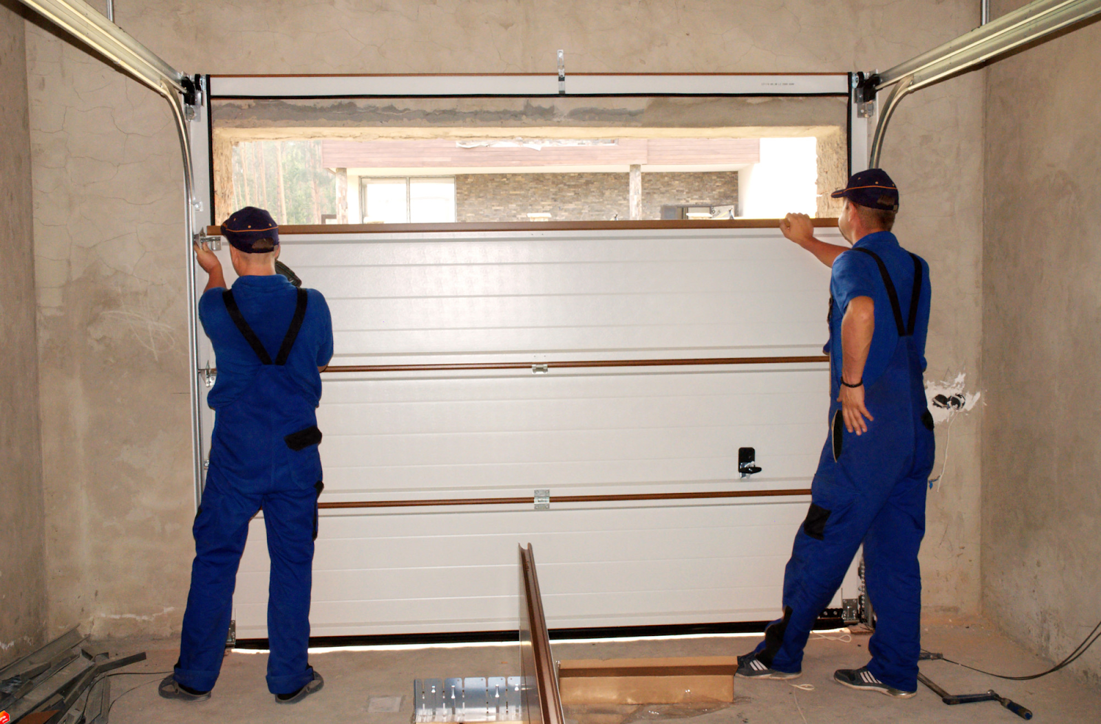 Garage Door Solutions: Navigating the Path from Repair to Replacement